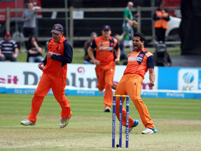 Mudassar Bukhari celebrates one of his four wickets for The Netherlands against Ireland