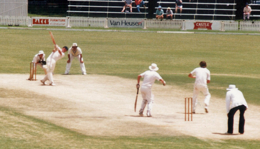 Jim Patterson hits a six over the pavilion at Harare Sports Club